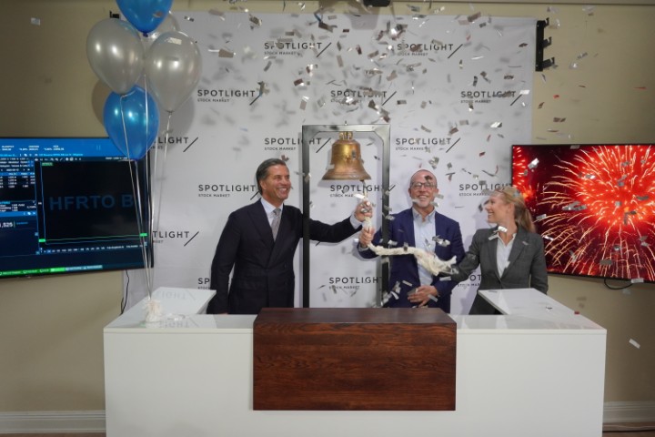 macbook pro on brown wooden table