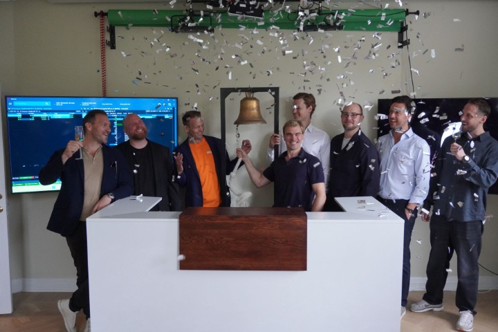 macbook pro on brown wooden table